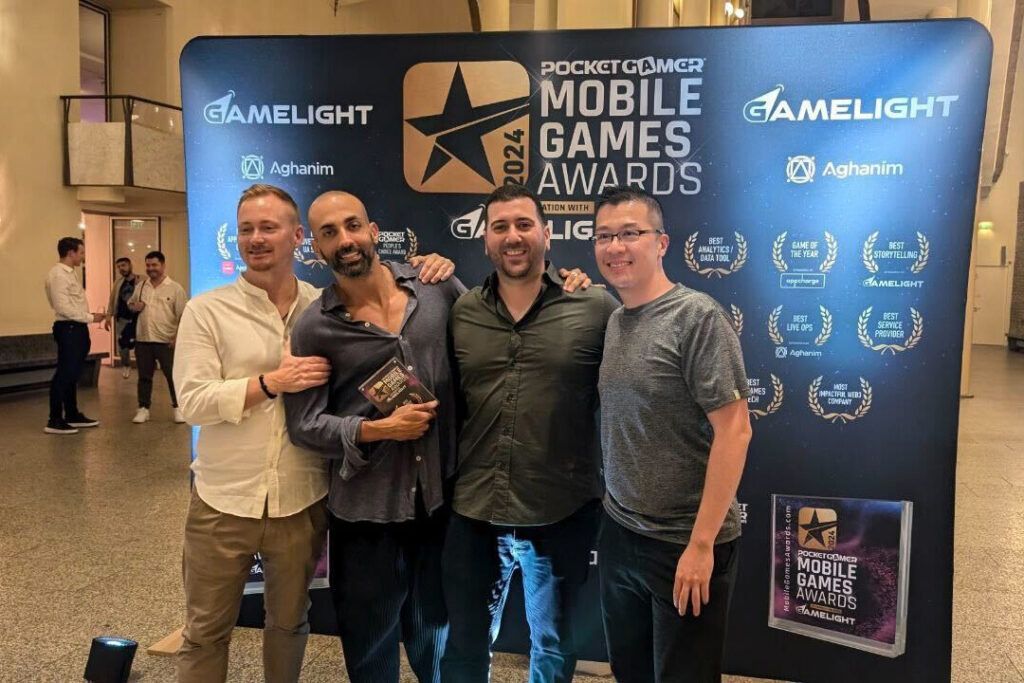 The Appcharge team holding their award for Best Payment Service Provider at the Pocket Gamer Awards 2024