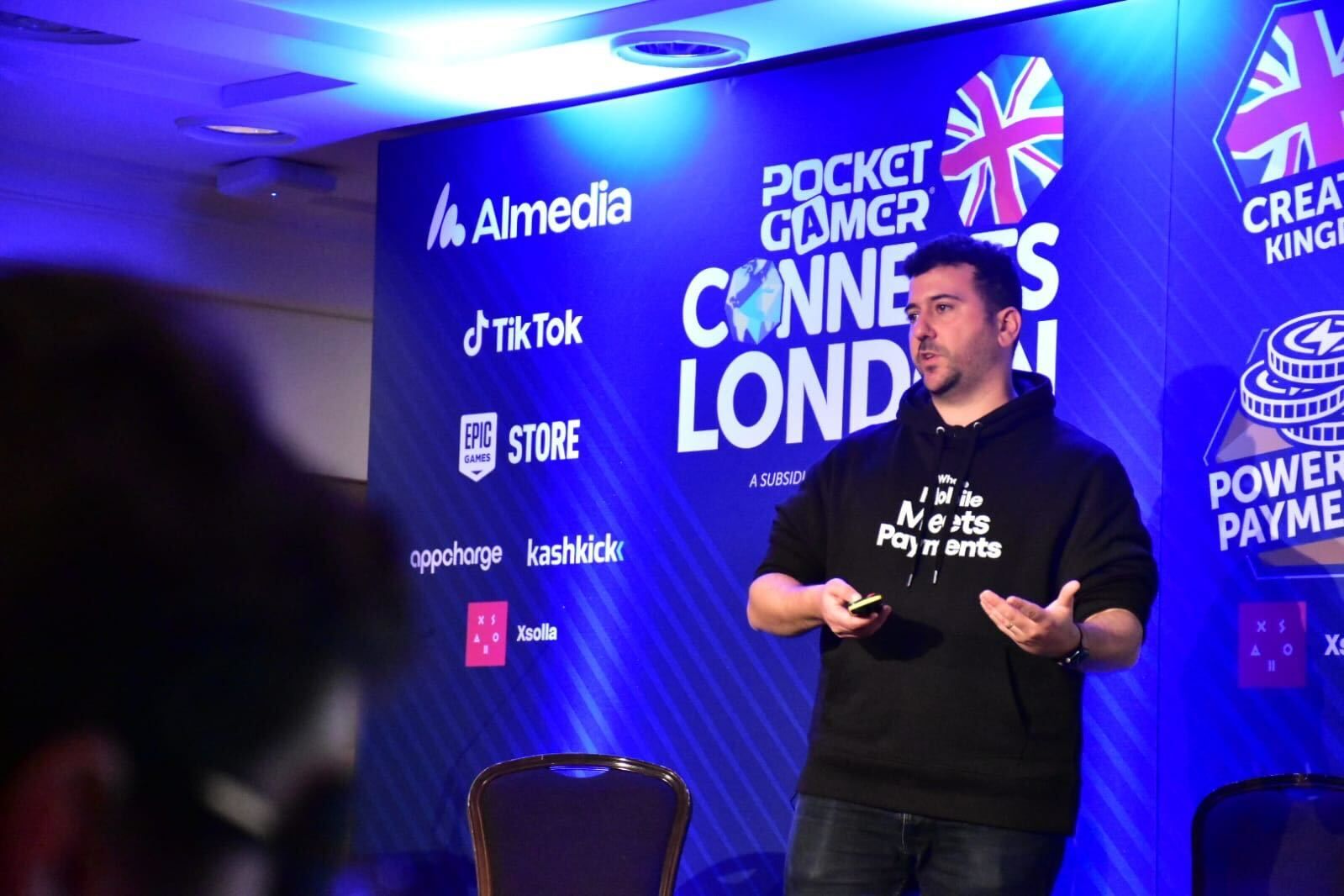 Gil Tov Ly giving a talk on Web Store Popularity at PGC London 2025.